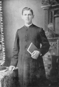 Father Theobald-Spetz holding a Book